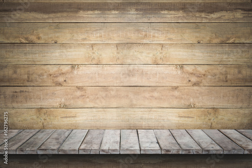 Empty wood shelf on old wood wall background for product display.