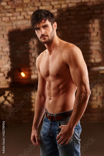 Obraz na plátně Sexy photo of young man with bare chest