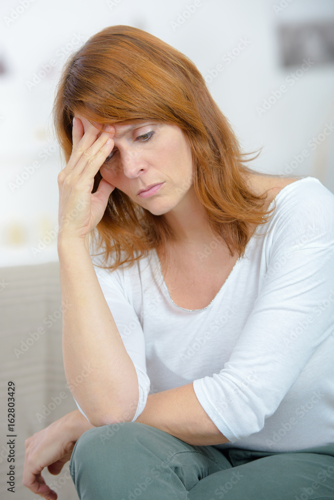 crying lonely woman on sofa at home crying lonely woman on sofa at home