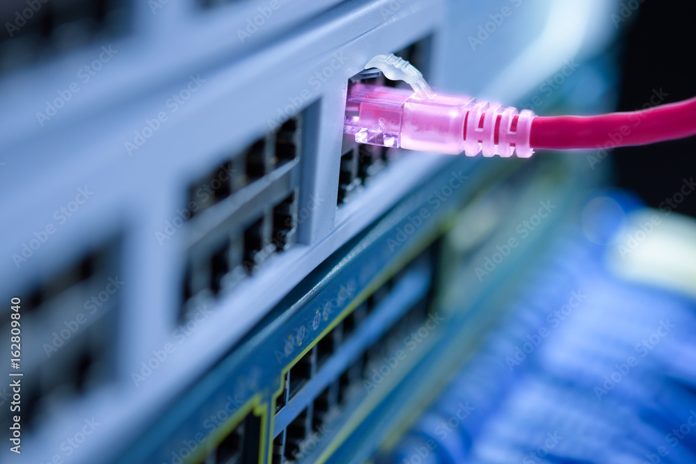 Network switch connected with RJ45 UTP cables Network switch connected with RJ45 UTP cables