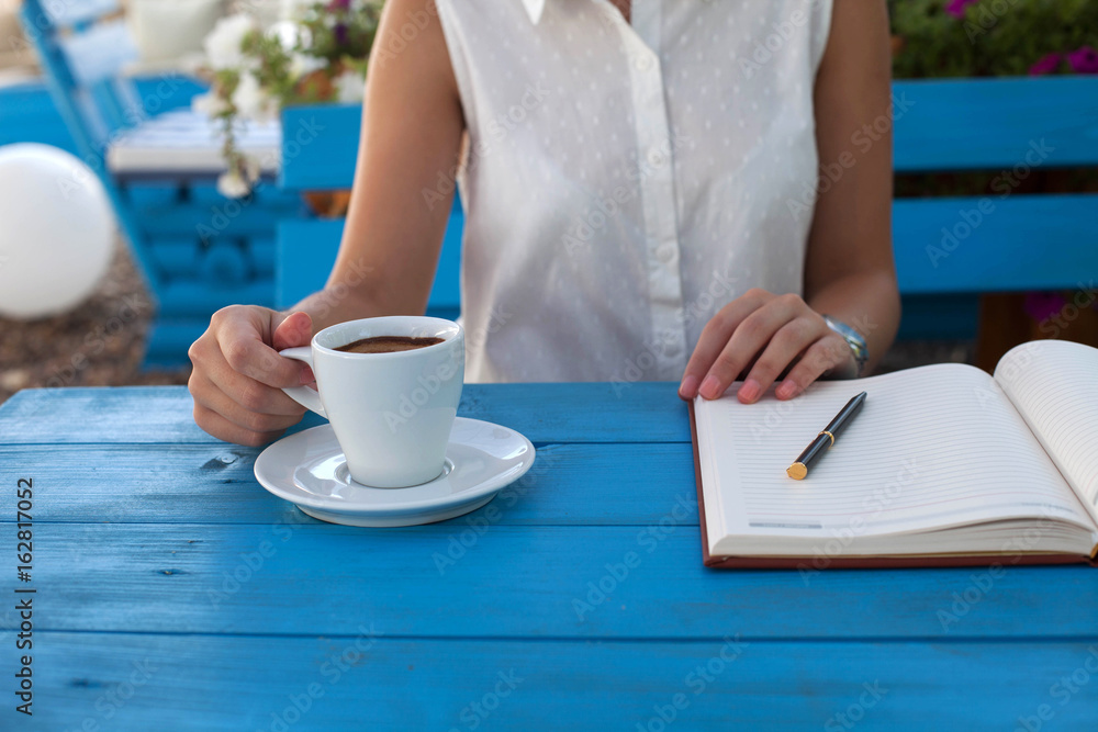 Young woman drinking coffee Young woman drinking coffee