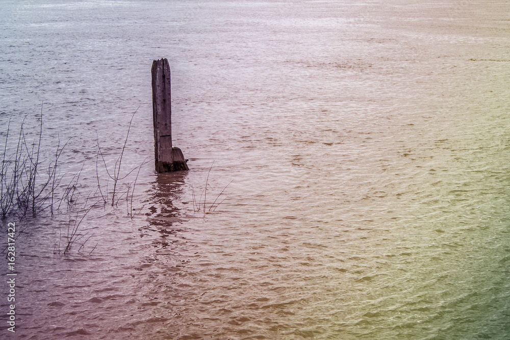 Beam protruding from colorful water abstraction Beam protruding from colorful water abstraction