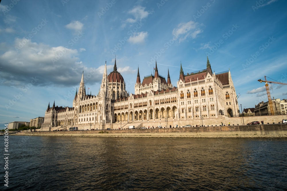 Hungarian Parliament Building, known as the Parliament of Budapest. It lies in Lajos Kossuth Square, on the bank of the Danube river.
