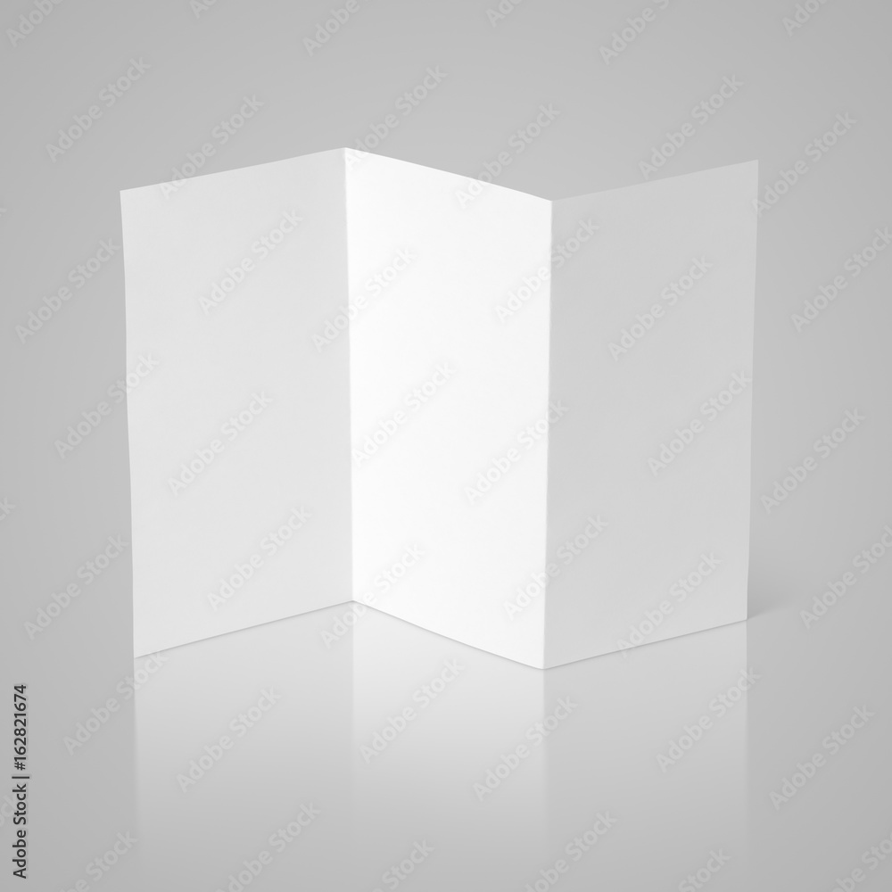 Empty white window fold flyer on gray background Empty white window fold flyer on gray background
