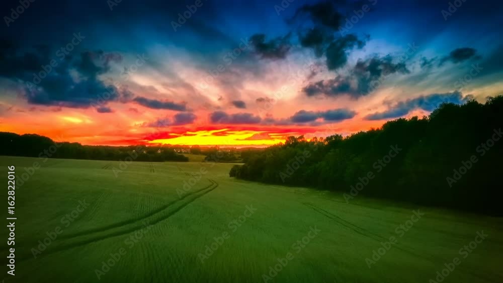 Aerial view of summer country at spectacular sunset. Nature background Aerial view of summer country at spectacular sunset. Nature background