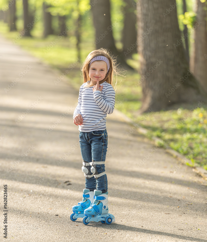 girl with helmet and skates in alley girl with helmet and skates in alley