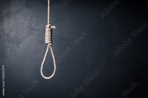 Slika na platnu the noose against sullen background, failure or commit suicide concept