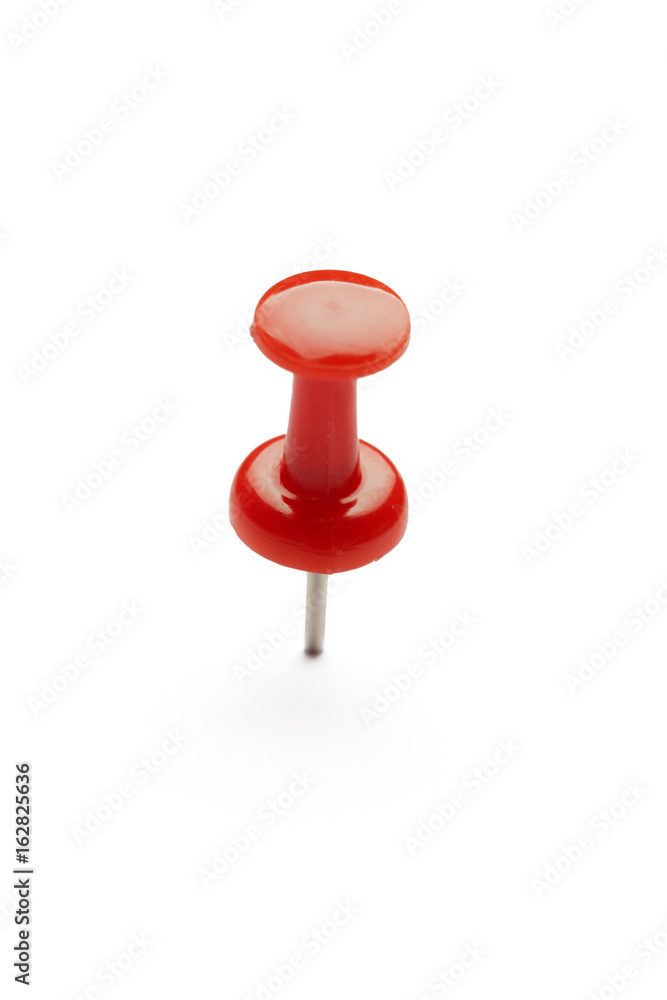 close up of a pushpin on white background close up of a pushpin on white background