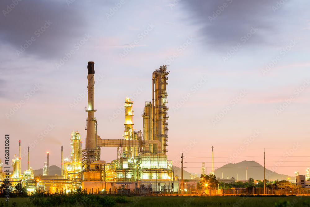 Fototapeta premium Oil gas refinery plant. May called petroleum, production or petrochemical plant. Industrial factory construction from engineering technology with steel pipe, pipeline, tank. Business for power energy.