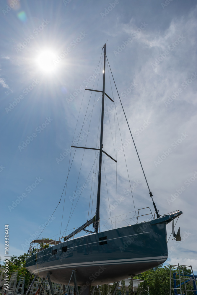 Sailing boat waiting for service and repair , Phuket in Thailand Sailing boat waiting for service and repair , Phuket in Thailand