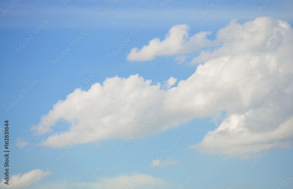 Fototapeta premium Blue sky with clouds background and textures.