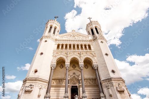 View from below on the famous Notre-Dame cathedral in Lyon in France photo