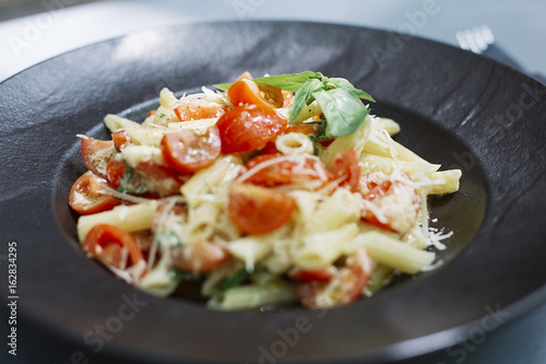 Penne pasta with cheese and...