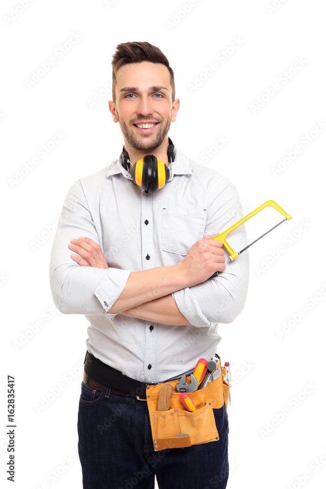 Young carpenter with tool-belt on white background Young carpenter with tool-belt on white background