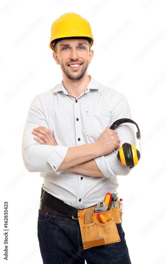 Young carpenter with tool-belt on white background Young carpenter with tool-belt on white background