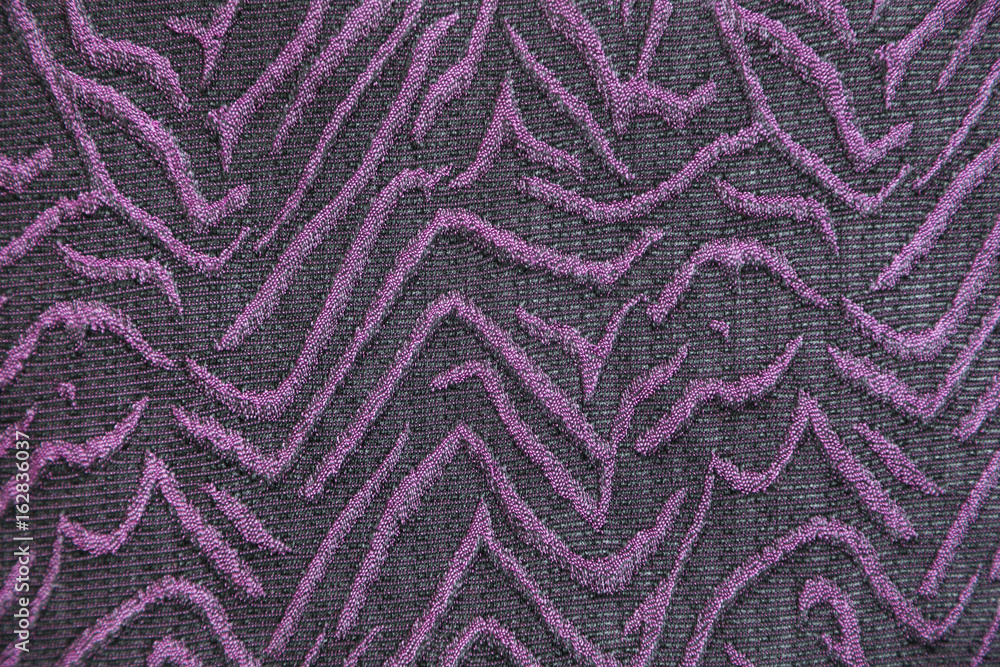 Knitwear fabric with purple abstract pattern