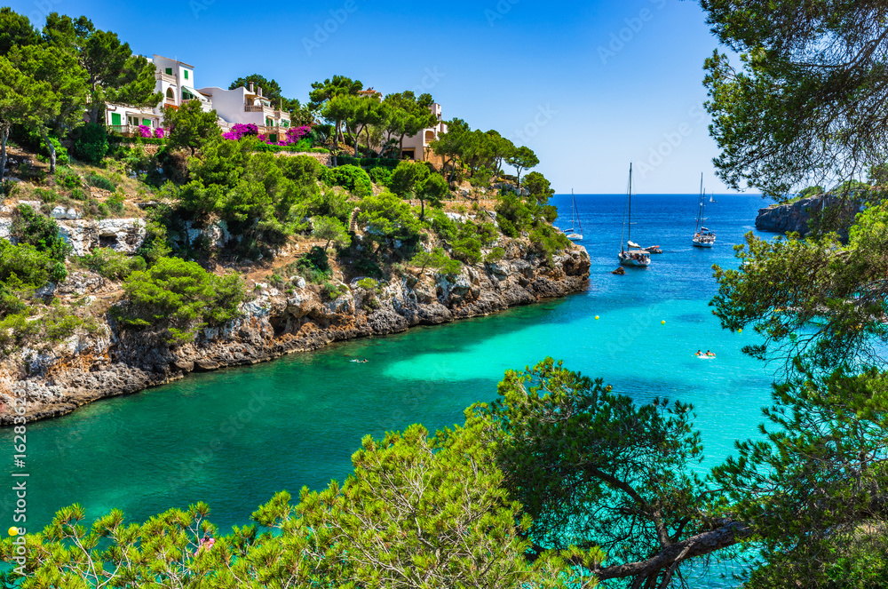 Picturesque seascape bay with boats, Spain Mediterranean Sea, Balearic Islands