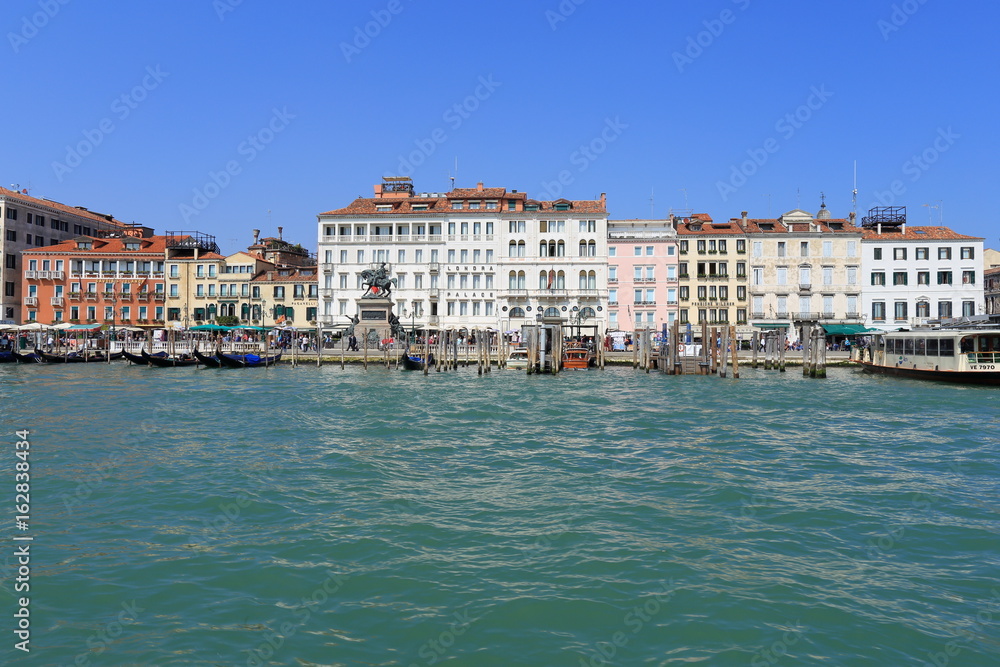 Venice - April 10, 2017: The view on Grand Canal (Canal Grande), on April 10, 2017 in Venice, Italy