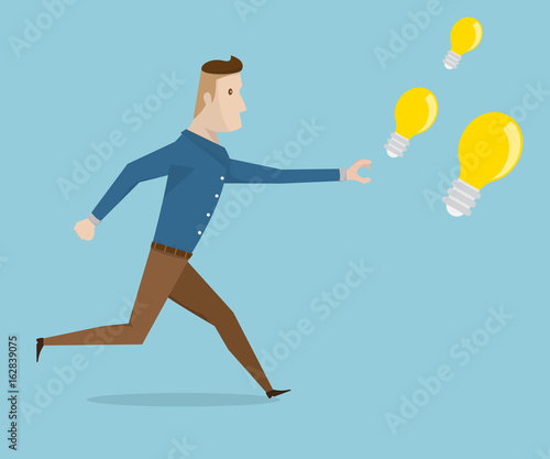 businessman running for catch bulb idea © nakedcm