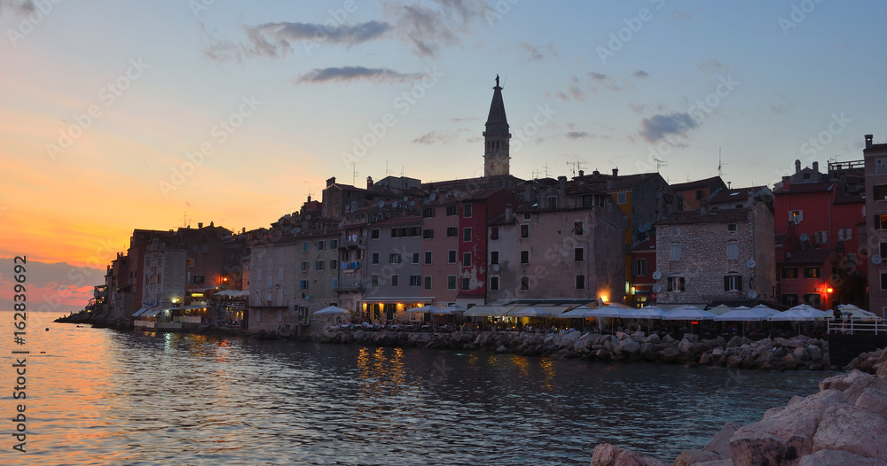 Evening view of Rovinj old town  peninsular  with the Church of St. Euphemia  on the Adriatic Coast  Line Istria Croatia.