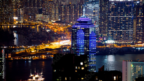 Hong Kong iconic night view from Victoria peak, Beautiful light illuminate skyscraper