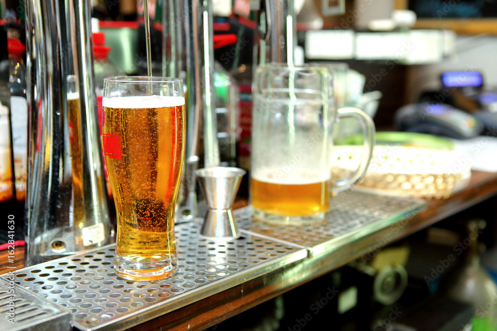 Golden soft drink or beer is a beautiful caramel color refreshing aroma and unique flavor. Golden soft drink or beer is a beautiful caramel color refreshing aroma and unique flavor.