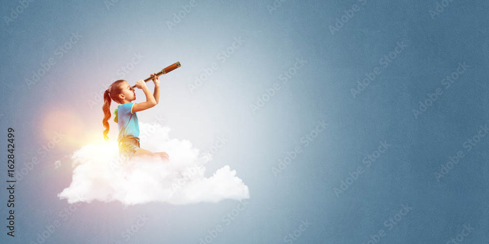 Concept of careless happy childhood with girl dreaming about future Concept of careless happy childhood with girl dreaming about future