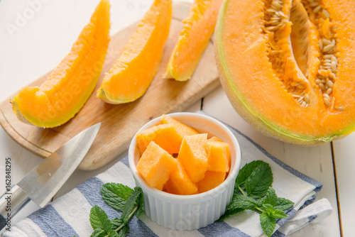 cantaloupe melon on the wooden table