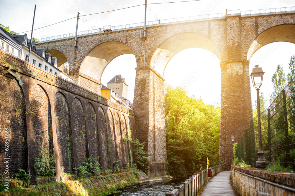 View from below on the old railway bridge in Luxembourg during the sunset