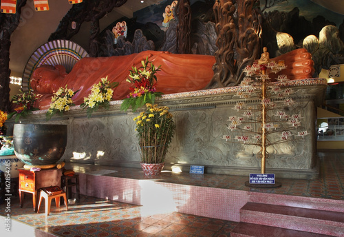  Reclining Buddha in Niet ban tinh xa monastery. Vung Tau. Vietnam photo