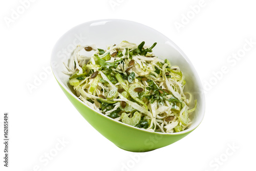 Coleslaw Cabbage Salad with Pumpkin Seeds Isolated on White background. Selective focus.