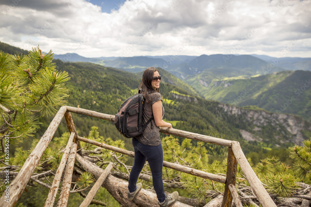 Wooden bridge viewing side young woman Wooden bridge viewing side young woman