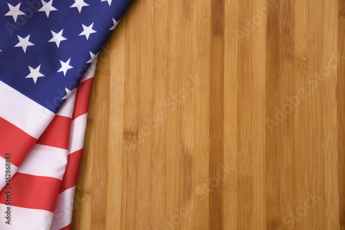 American flags on wood table.