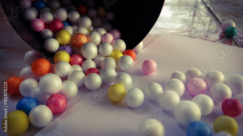 Colorful bubbles on wood background
