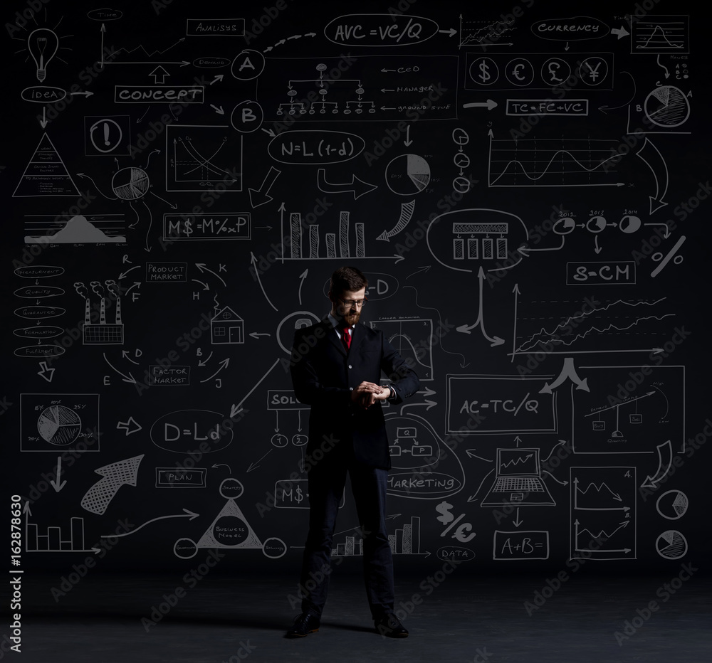 Businessman standing over schematic background. Business and office, concept. Businessman standing over schematic background. Business and office, concept.