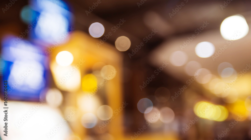 Blurred background of shopping mall with bokeh.