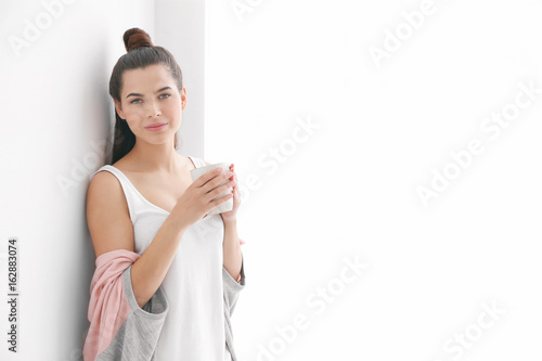 Beautiful woman drinking co...