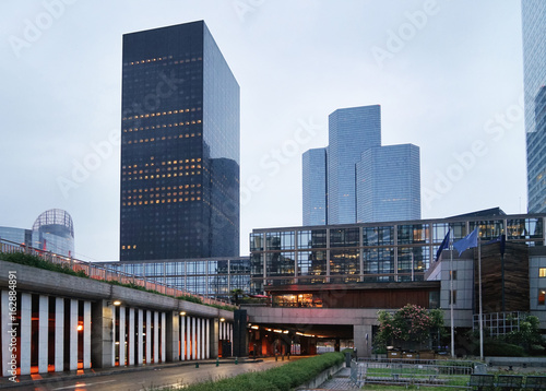 View of modern buildings in big city at evening
