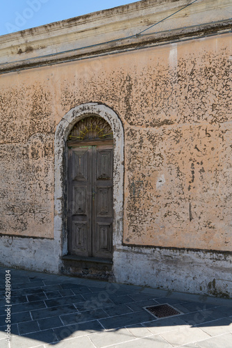 House with weathered front and door © Lux