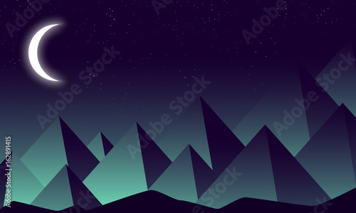 Crescent moon against the background of the night mountains