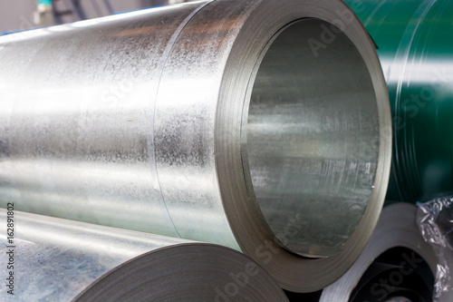 rolls of sheet metal (steel) at industry (background)