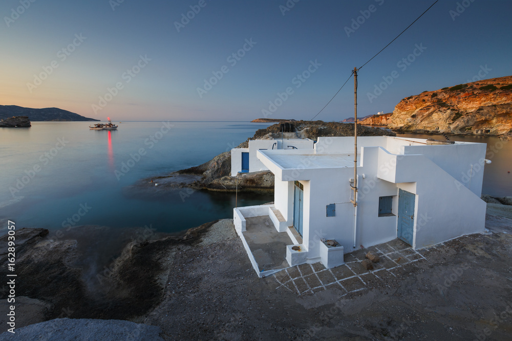 Boat houses in fishing village of Goupa on Kimolos island in Greece.
Boat houses in fishing village of Goupa on Kimolos island in Greece.
