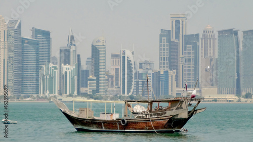 a dhow moored in the port of doha, in qatar © daniele russo