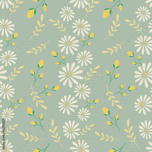 Vector seamless texture. Embroidery floral design with camomiles. Decorative pastel flowers pattern