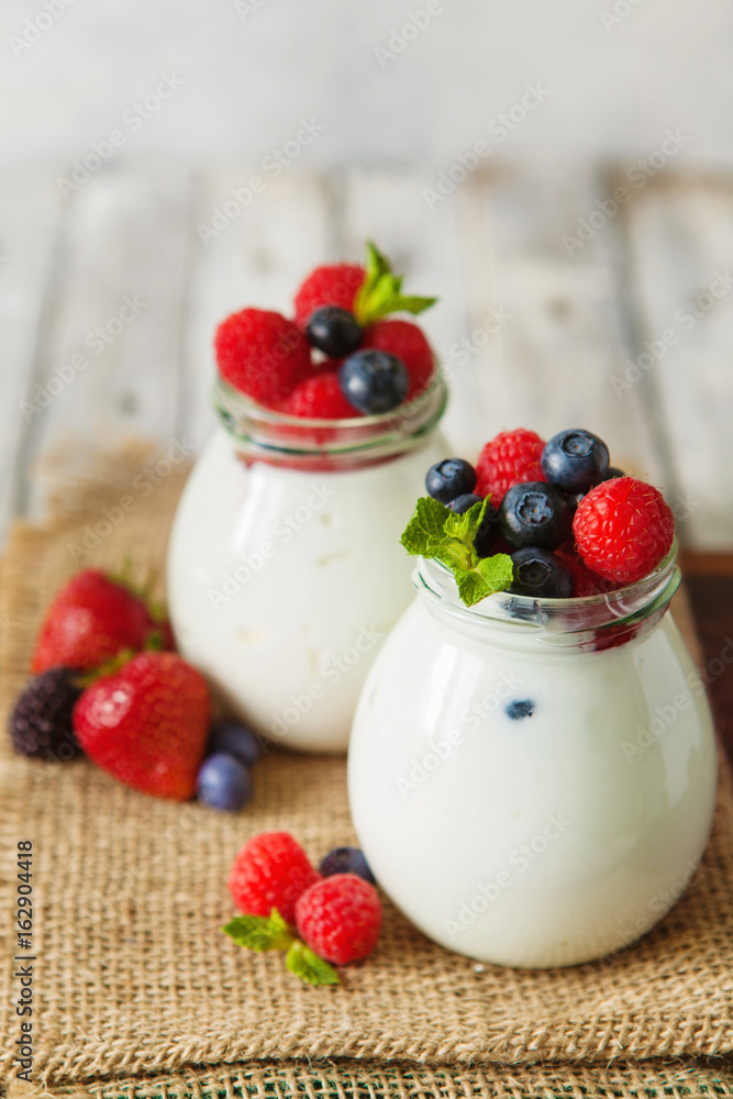 Natural yogurt with fresh berries and nuts Natural yogurt with fresh berries and nuts