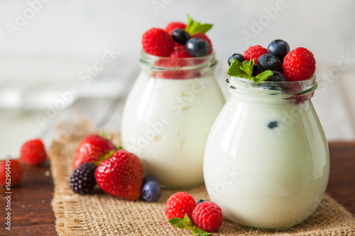 Natural yogurt with fresh berries and nuts