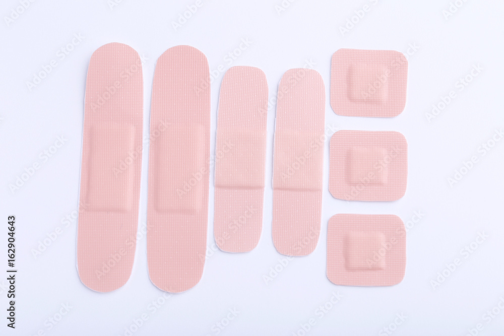 Medical plasters on a white background Medical plasters on a white background