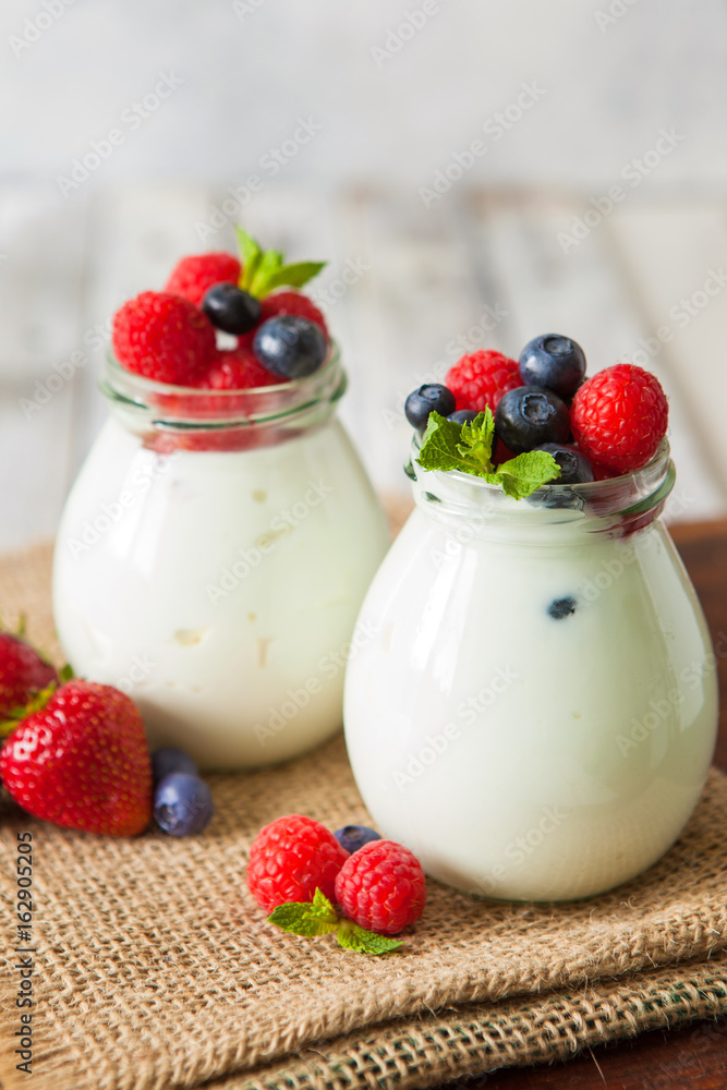 Natural yogurt with fresh berries and nuts Natural yogurt with fresh berries and nuts