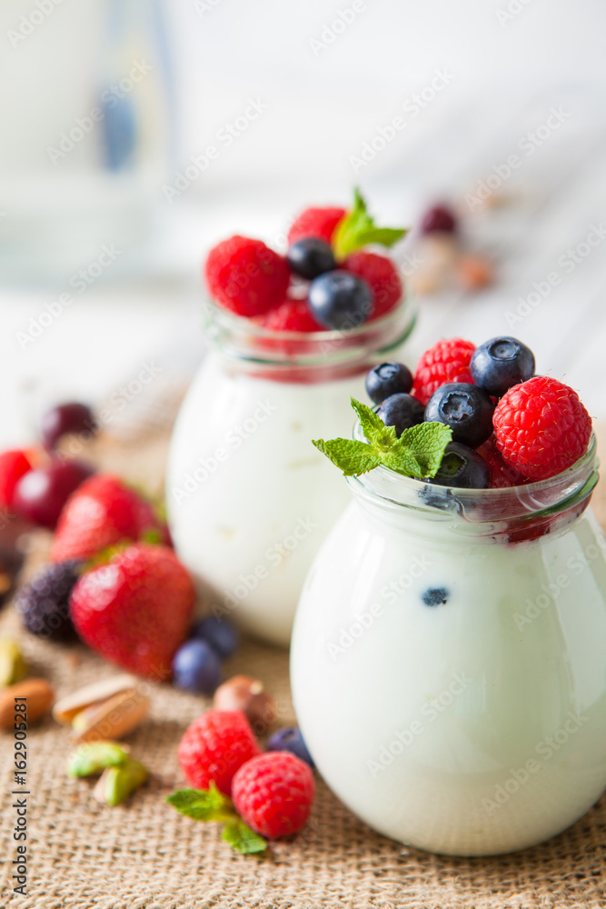 Natural yogurt with fresh berries and nuts Natural yogurt with fresh berries and nuts