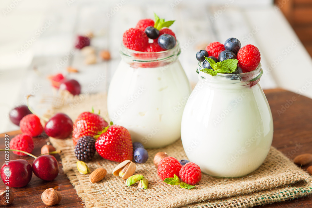 Natural yogurt with fresh berries and nuts Natural yogurt with fresh berries and nuts